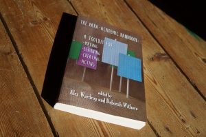 Para-Academic Handbook cover, a series of blank placards, photograph by Rachael House