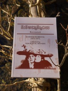 Sistershow Revisited cover, pink background, sepia style image of two women under a giant hat