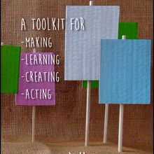 Para-Academic Handbook cover, a series of blank placards, photograph by Rachael House