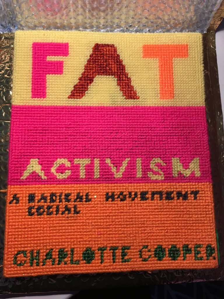 crocheted version of Fat Activism cover created by Allyson Mitchell